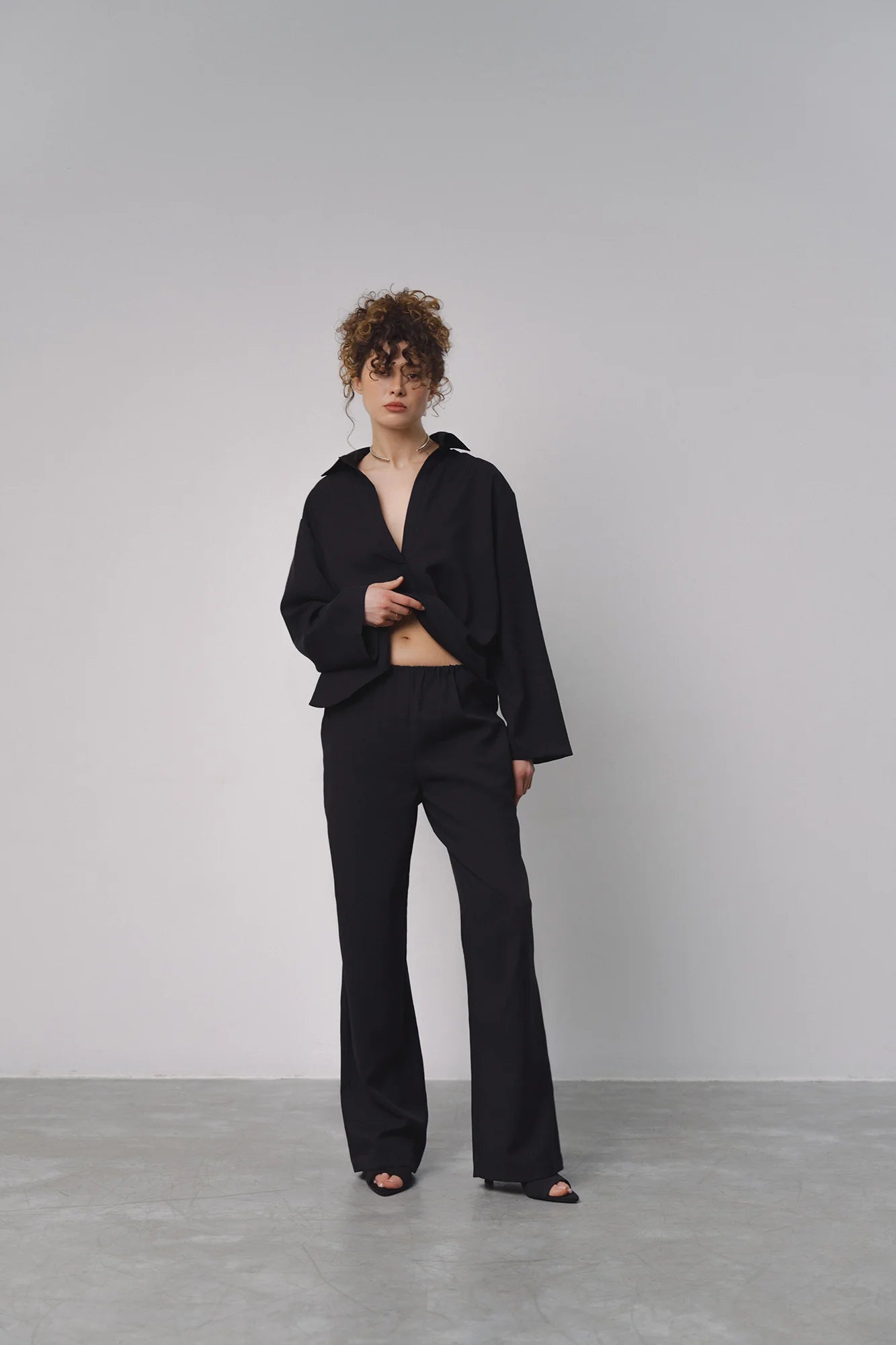 Брюки до сорочки на затяжках