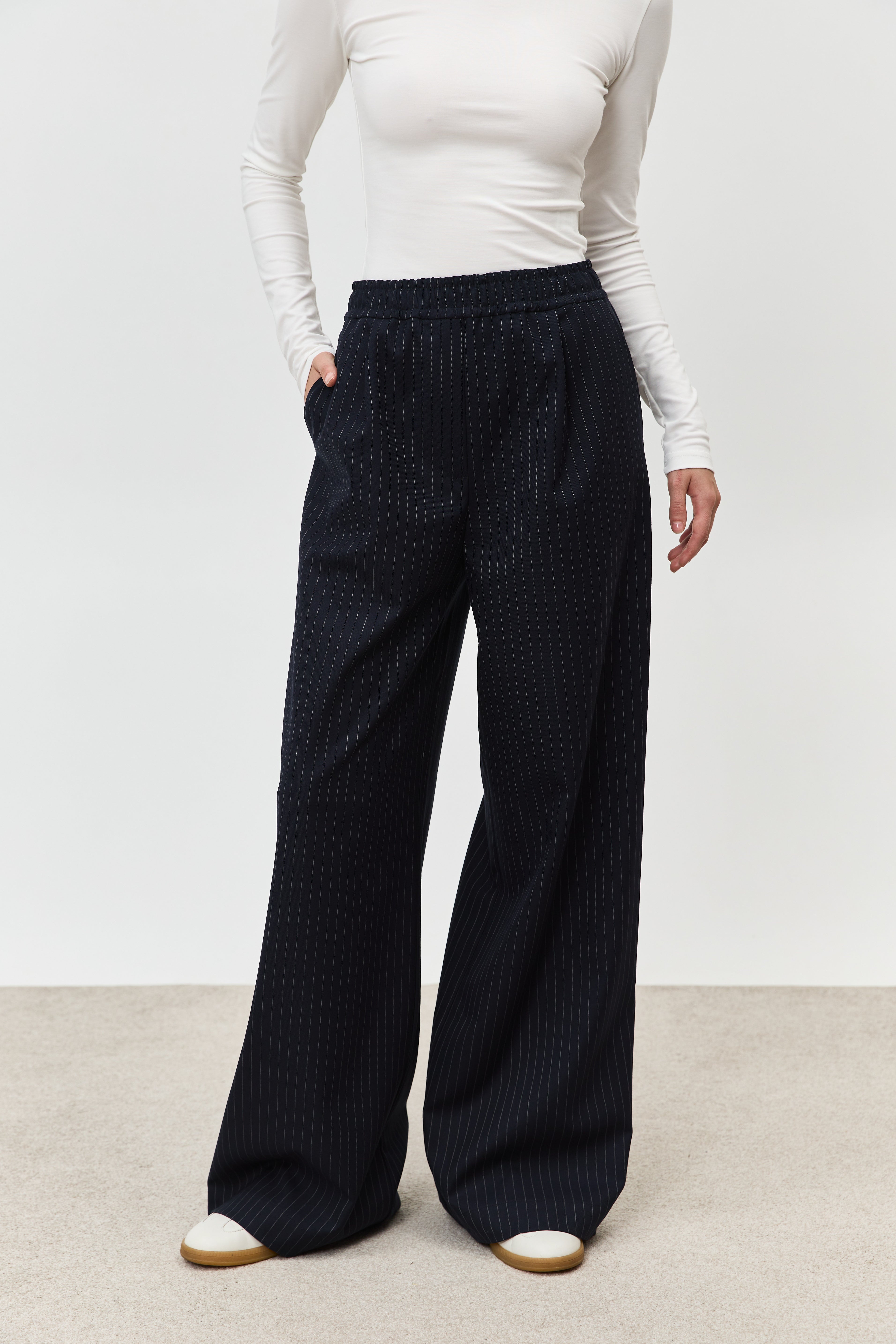 Брюки вільні в смужку